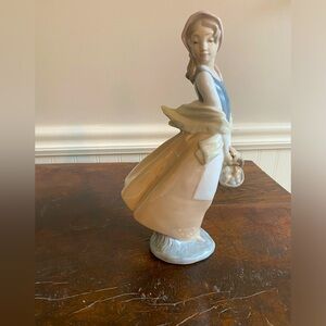 NAO by Lladro figurine girl with basket - pre-owned